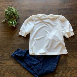 White quarter length shirt, polyester.